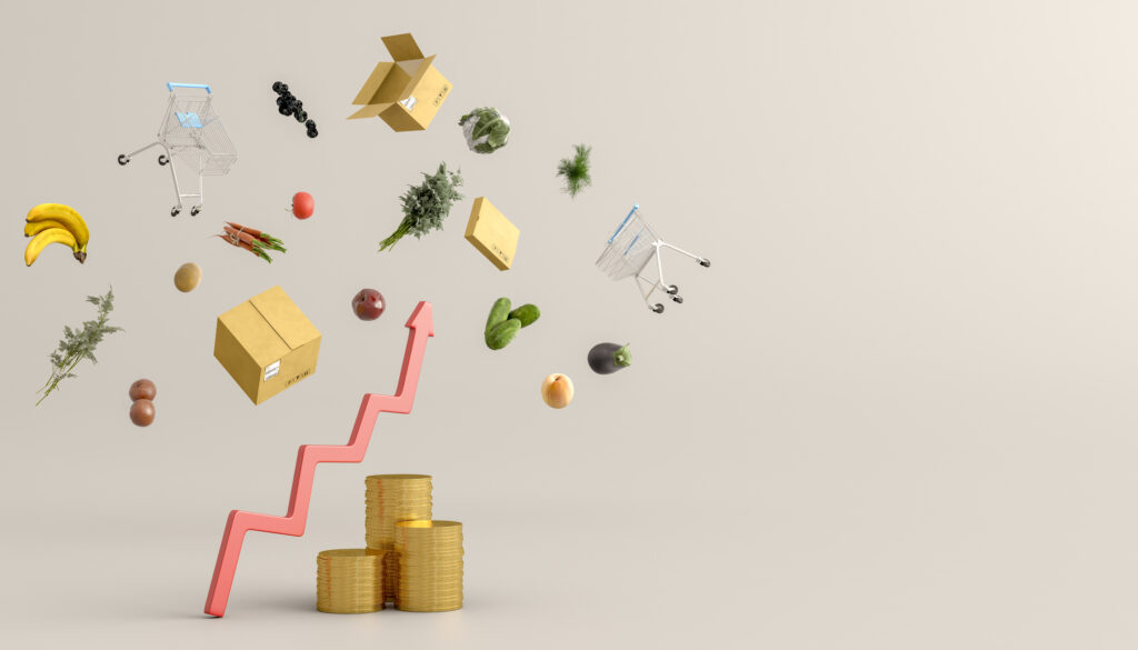 inflation concept upward arrow above stack of coins and groceries flying