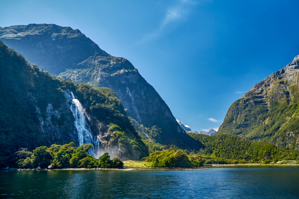 New Zealand landscape view: Bowen Falls is a waterfall in the Milford Sound area of Fiordland National Park, Southland, New Zealand.