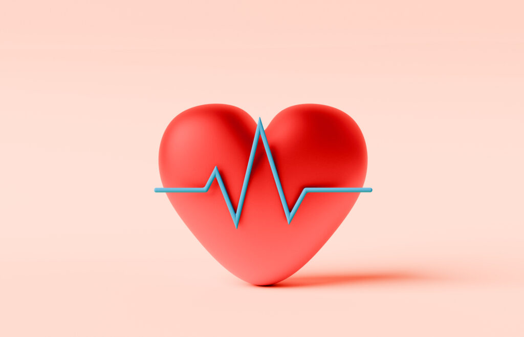 digital image of a red heart with a blue ekg symbol running through it