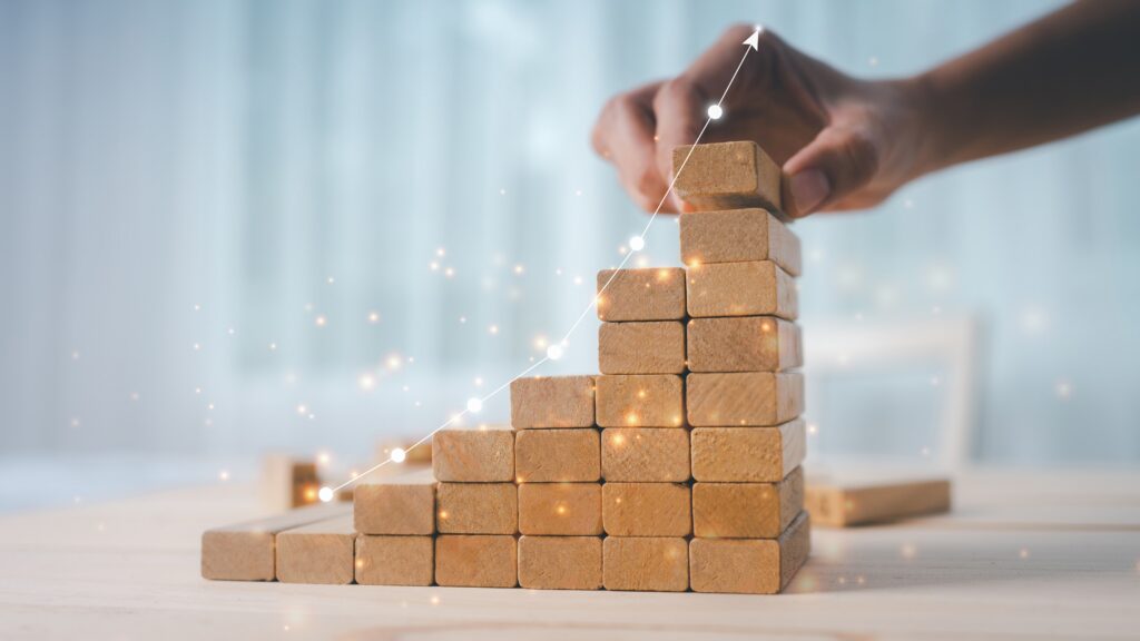 Stacks of wooden blocks that get progressively higher.