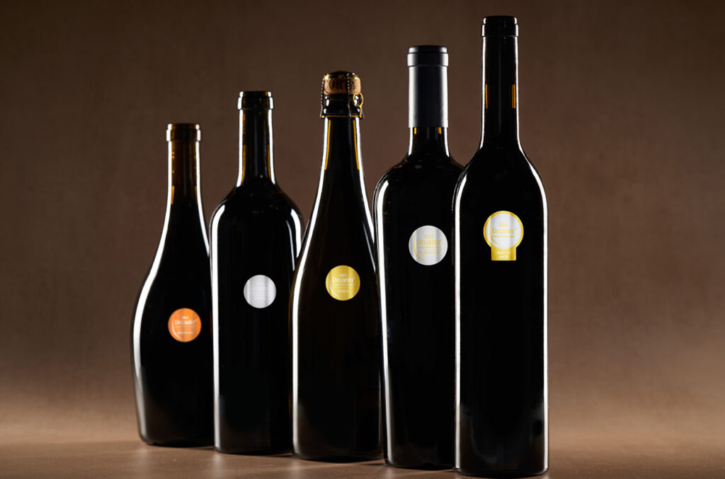 Bottles of wine with medal stickers on them.