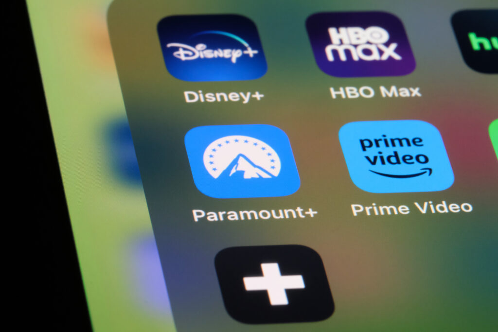 Paramount+ App icon on cell phone screen.