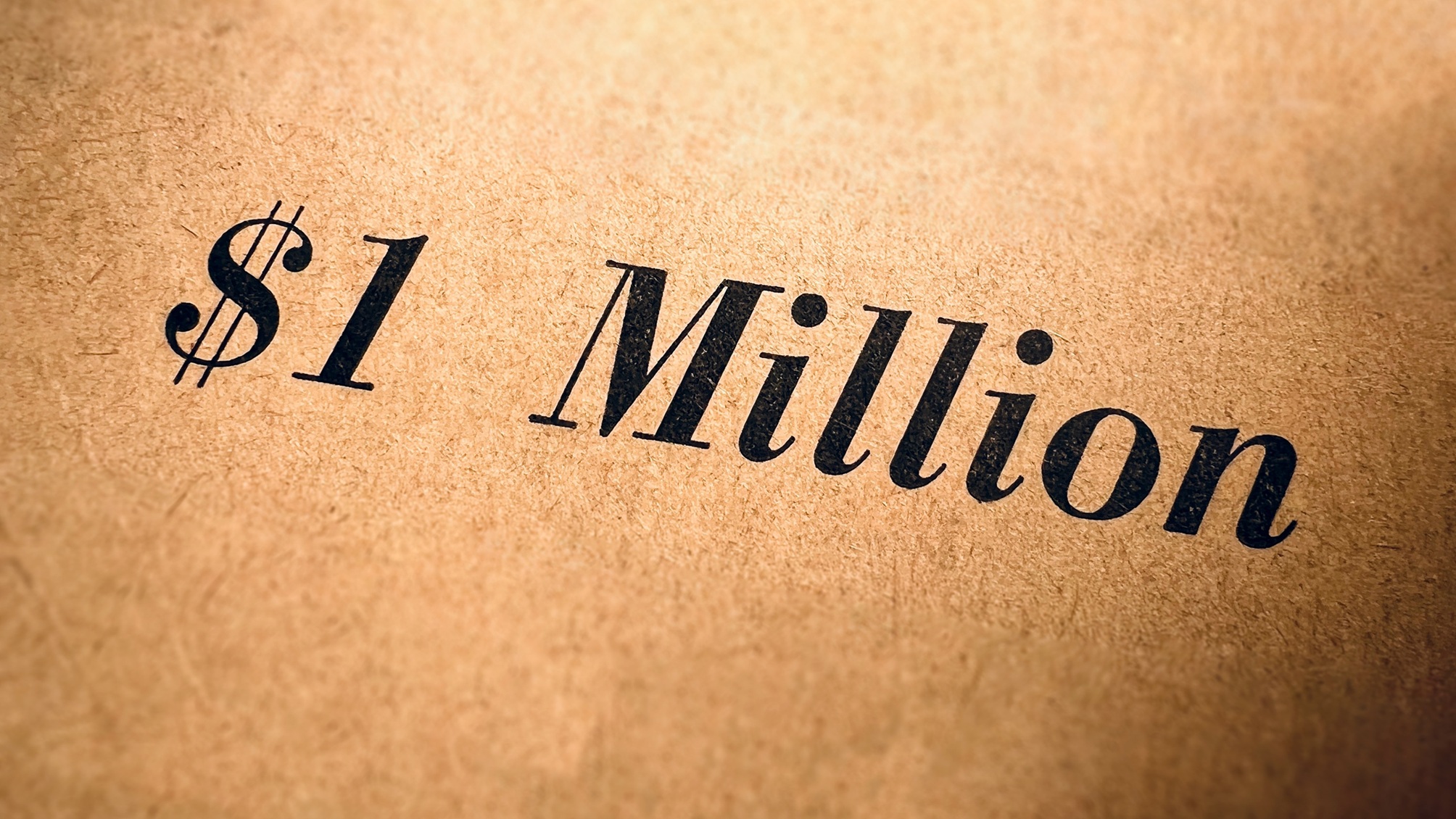 1 million de dollars écrit sur un parchemin.