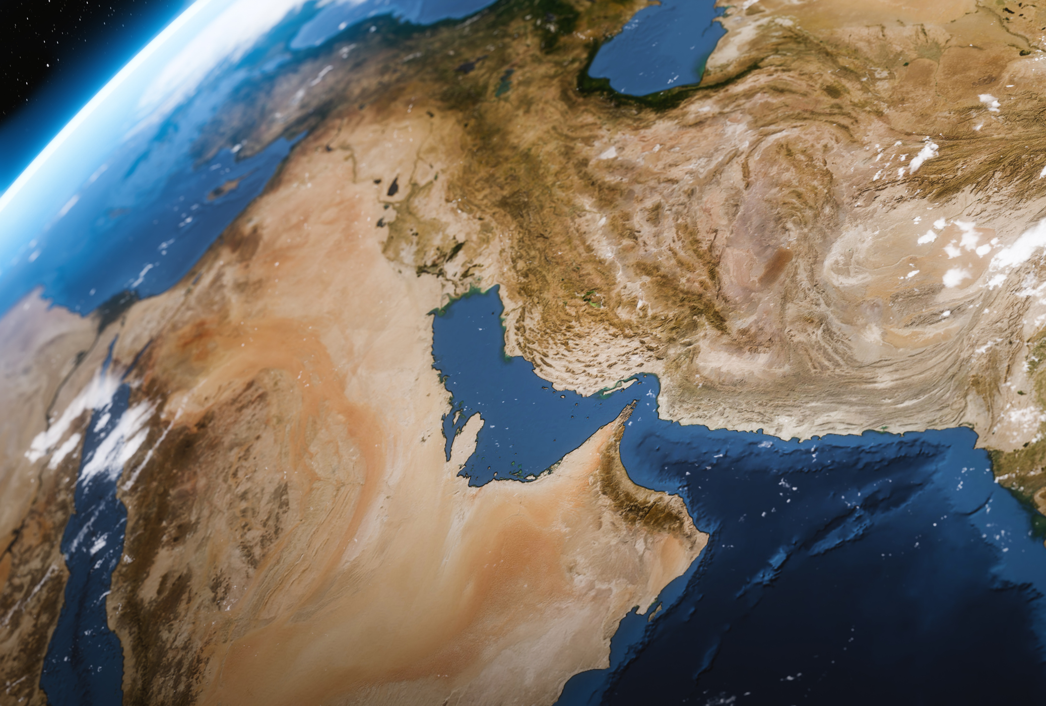 Une vue satellite en grand angle montrant le détroit d'Ormuz, le golfe Persique et la topographie désertique accidentée du Moyen-Orient.