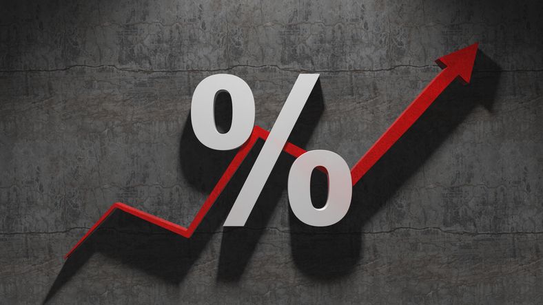 percentage sign superimposed over a red arrow stair-stepping higher